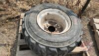 Used Superwall 12-16.5 NHS tire, H46