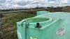 approx 1200 gallon poly water tank, 1" valve, J98 - 5