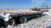 1994, Doepker Super B Flat Deck Trailer, bale extensions, strap winches, 255/70R22.5 rubber, steel deck (lead), plank deck (pup), Lead VIN: 2D9HBFA38R1016163, Pup VIN: 2D9HBFZ25R10106164 - 5