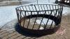 Skirted rd bale sheep feeder