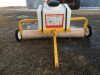 *Danville Express rolling dandelion chemical applicator