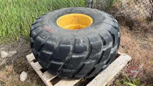 21.5L-16.1SL used tire on 10 bolt rim, F33