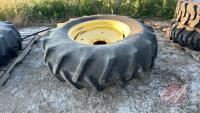 14.9-24 Firestone tractor tire on rim, H172