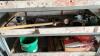 Shelf of Pipe wrench, slow moving sign, sledge hammer, hoses & belting - 4