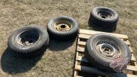 (4) Used truck tires on rims