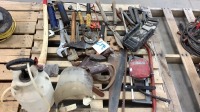 Assorted tools pipe wrench saws