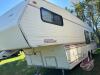 1990 29.5' Travelaire 5th Wheel Camper, VIN: 2TT285W05L1T20787, K41, Owner: Jason T Blixhavn, Seller: Fraser Auction ________________________ **Keys and TOD in office trailer** - 6