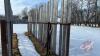 30&rsquo; free standing windbreak panel w/ boards (some boards missing) - 2