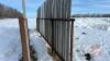 30&rsquo; free standing windbreak panel w/ boards (some boards missing) - 2