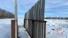 30&rsquo; free standing windbreak panel w/ boards (some boards missing) - 3