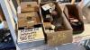 Pallet w/ (2) boxes of JD corn header parts, elec motor for potato box end gate, Champion spark plugs, box of hose clamps