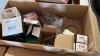 Pallet w/ (2) boxes of JD corn header parts, elec motor for potato box end gate, Champion spark plugs, box of hose clamps - 6