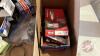 Pallet w/ (2) boxes of JD corn header parts, elec motor for potato box end gate, Champion spark plugs, box of hose clamps - 8