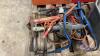 Pallet w/ (2) bench top tool boxes (empty), plastic tool box w/ barn door track parts, plastic toolbox w/ hose clamps, steel chainsaw blade, pressure washer wand nozzle, (2) imp jacks, (2) sets of booster cables, asst&rsquo;d farm chemicals (full jug of Grazon - 7