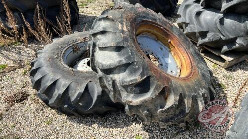 Used 14.9-24 imp tire on 8 bolt rim w/ fluid