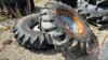 Used 14.9-24 imp tire on 8 bolt rim w/ fluid