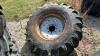 Used 14.9-24 imp tire on 8 bolt rim w/ fluid - 3