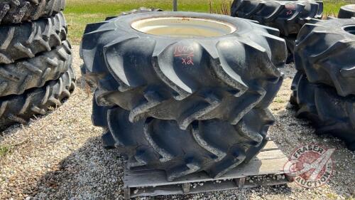 Used 18.4-26 imp tire on white 8 bolt rim