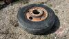 Used 11R24.5 truck tire on rim