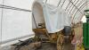 Horse drawn covered wagon