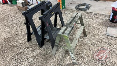 Plastic Stanley sawhorses and aluminum step ladder