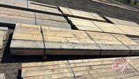 Lift of (16) 2" x 10" x 12' spruce lumber, F43