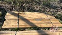 Lift of (24) 2" x 4" x 8' pressure treated sienna lumber, F43