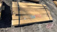 Lift of (18) 1" x 6" x 5' pressure treated sienna lumber, F43