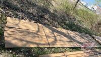 Lift of (12) 2" x 4" x 16' pressure treated sienna lumber, F43