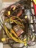 Snap on creeper, ratchet strap 2", trouble light, extension cords - heavy + light, tarp straps etc - 4