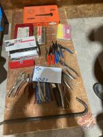 Set of steel cotter pins, set of O rings, set of grease fittings, set of machine bushings, die grinder and attachments, impact driver, vice grips, snap ring pliers, flare nut wrenches, goose neck