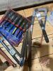 Lots of screwdrivers, 7pc nut driver set, hack saw, (2) squares, trouble light, hammers, level, 20' of 3/8" chain - 3