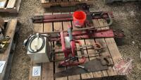 Pallet w/ halogen flood light, halogen shop heater, meat saw, hand saw, set of loader brackets for mounting 2400 series IH loader to 4400 series JD tractor
