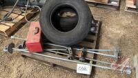 Pallet w/ Black and Decker angle grinder, (4) screw in bin anchors, Red metal toolbox (empty), (Used) Good Year 11L-15F1 imp tire, (Used) Good Year 9.5L-14 imp tire on 6 bolt rim