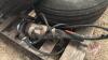 Pallet w/ Black and Decker angle grinder, (4) screw in bin anchors, Red metal toolbox (empty), (Used) Good Year 11L-15F1 imp tire, (Used) Good Year 9.5L-14 imp tire on 6 bolt rim - 6