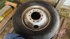 Pallet w/ (Used) Bridgestone 11R24.5 tire on (New) steel bud rim, poly tarp w/ tarp straps - 2