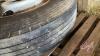 Pallet w/ (Used) Bridgestone 11R24.5 tire on (New) steel bud rim, poly tarp w/ tarp straps - 3