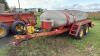 800-gal tank on Versatile 3000 sprayer frame tandem axel wagon