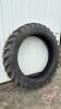 Used Firestone 320/90R46 tire (was damaged by crop divider but still held air)