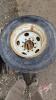 Used 11R22.5 tire on rim