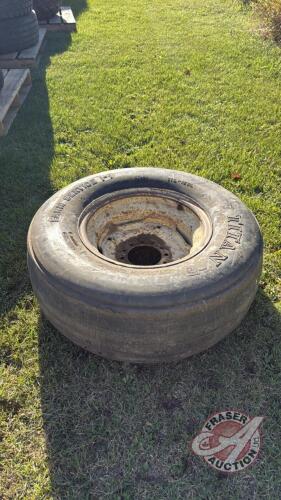 Used Titan 11L-15SL tire on 6-bolt rim