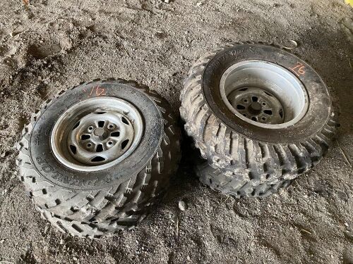 *used quad tires on 4-bolt rims, 25x8-12 fronts, 25x10 - 12 rears