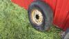 Used 7.60-15SL imp tire on rim - 2