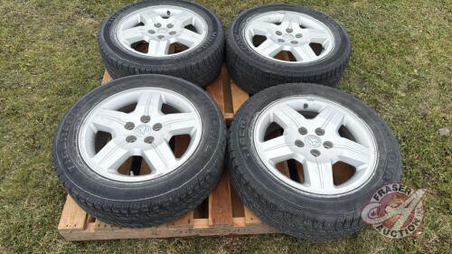Used Uniroyal Tiger Paw P215/60R17 tires on Dodge 5-bolt rims