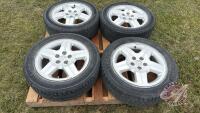 Used Uniroyal Tiger Paw P215/60R17 tires on Dodge 5-bolt rims
