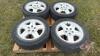 Used Uniroyal Tiger Paw P215/60R17 tires on Dodge 5-bolt rims