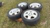 Used Uniroyal Tiger Paw P215/60R17 tires on Dodge 5-bolt rims - 4
