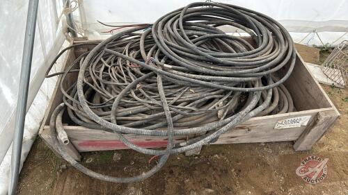 Crate of assorted hydraulic hose and electrical wire