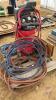Pallet of air hose, shop creeper, and air compressor Pallet Q - 3