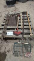 Assortment of rakes, post hole bars, shovels, spade, and pick- HHHH